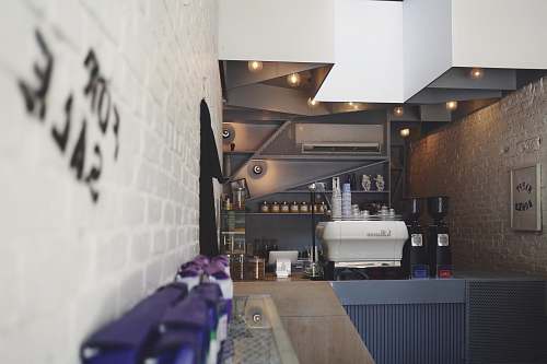 happy bones selective photo of white and black kitchen interior indoors